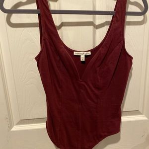 Maroon low cut bodysuit